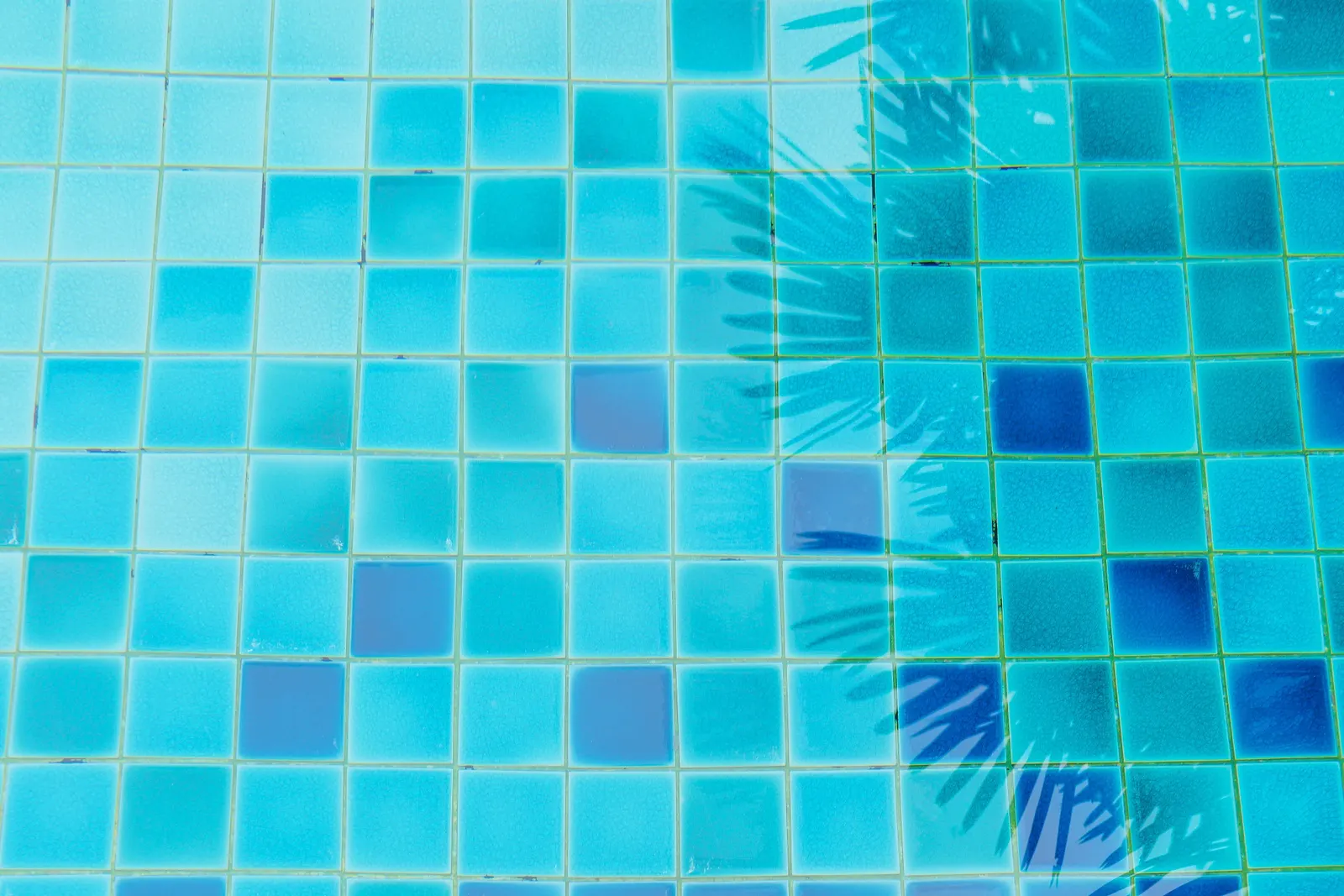 Close-up of pebble pool finish on a Pilot Point, TX backyard pool